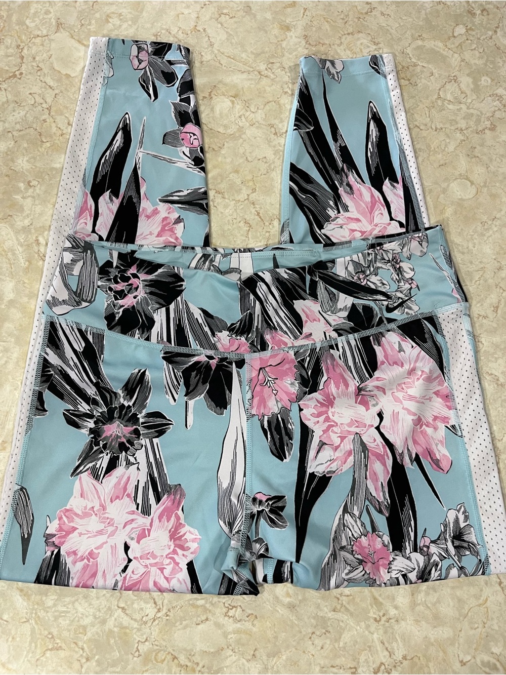 Nike Light Blue Floral Athletic Shorts with Pink Accents